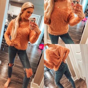 Fuzzy twisted back sweater